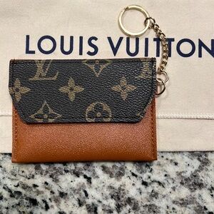 Louis Vuitton Monogram Key Holder in Black and Brown